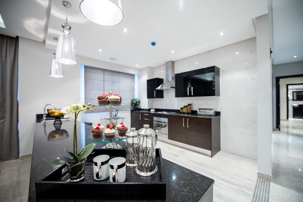Al Manzil Residence Manama Habitación foto